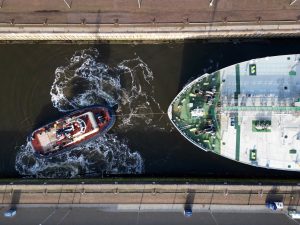 Tug boat in canal - AMI Marine